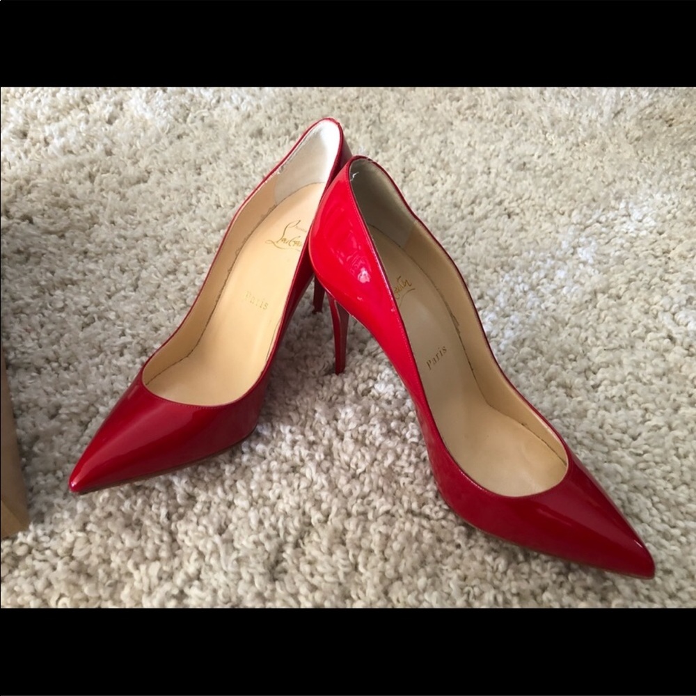 Christian Louboutin Red Heels size 39.